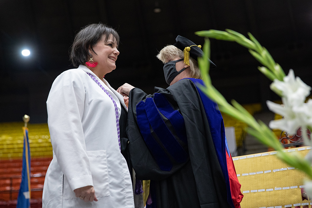 A ULM Nursing graduate receives her pin.