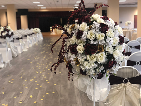 multiple table settings with flowers