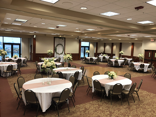 multiple table settings with flowers