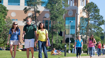 Photo of students walking on campus