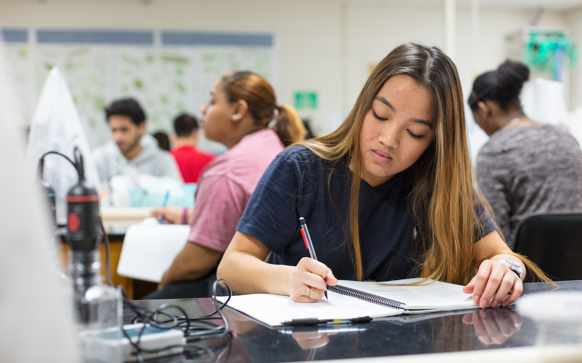 Student Taking Notes